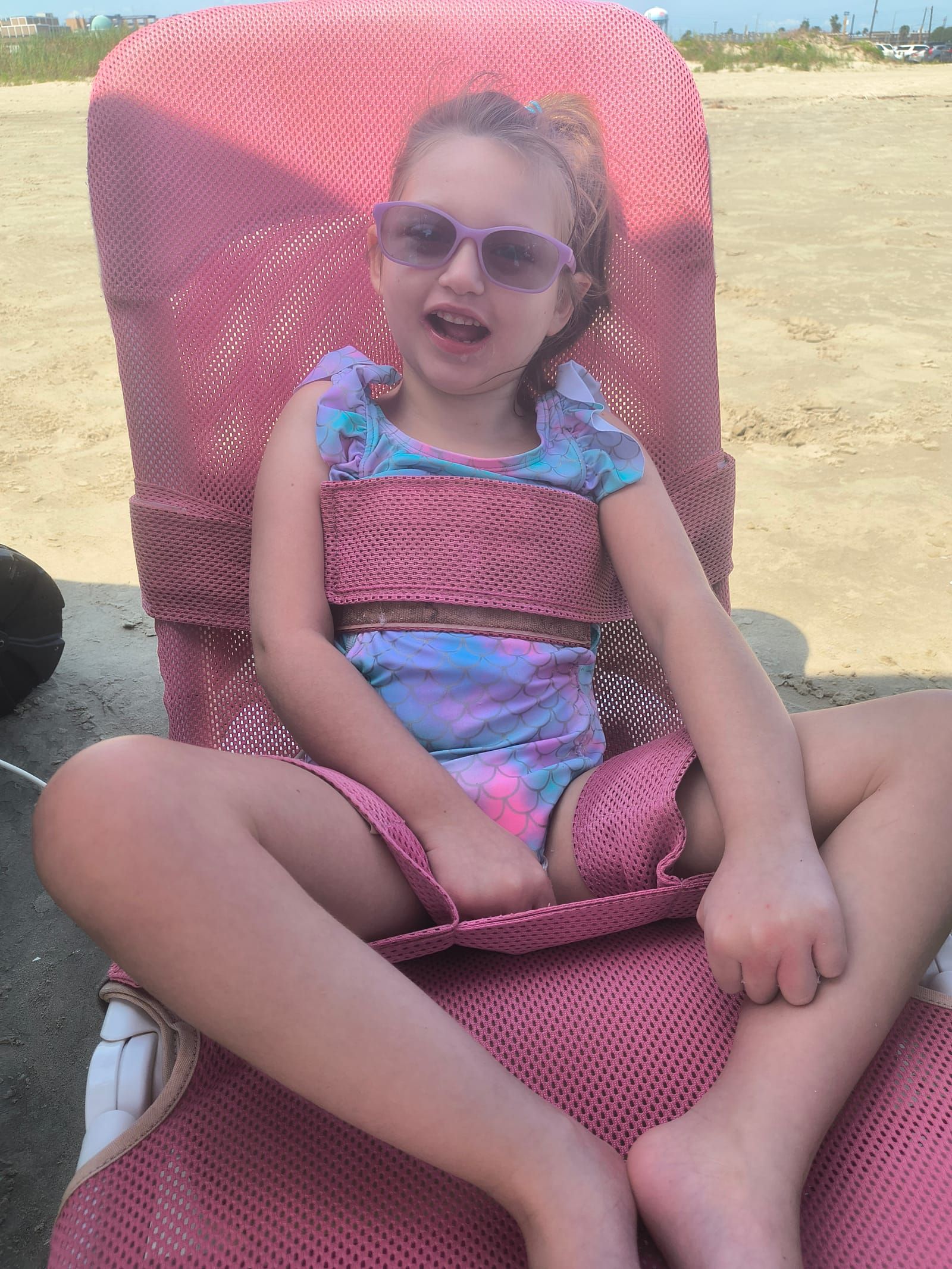 Jenna outside in her chair