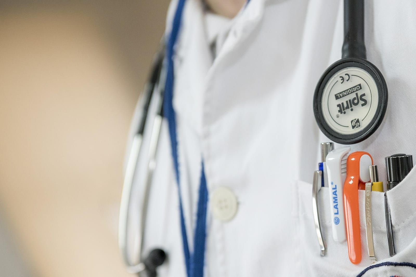 A doctor reviewing a patient's symptoms