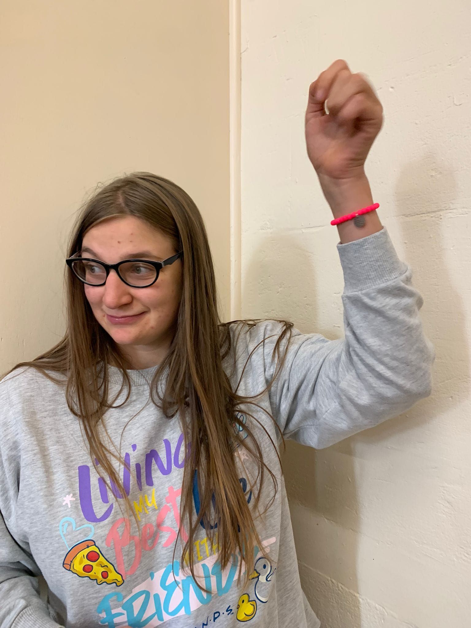 Jess wearing a CASK awareness bracelet