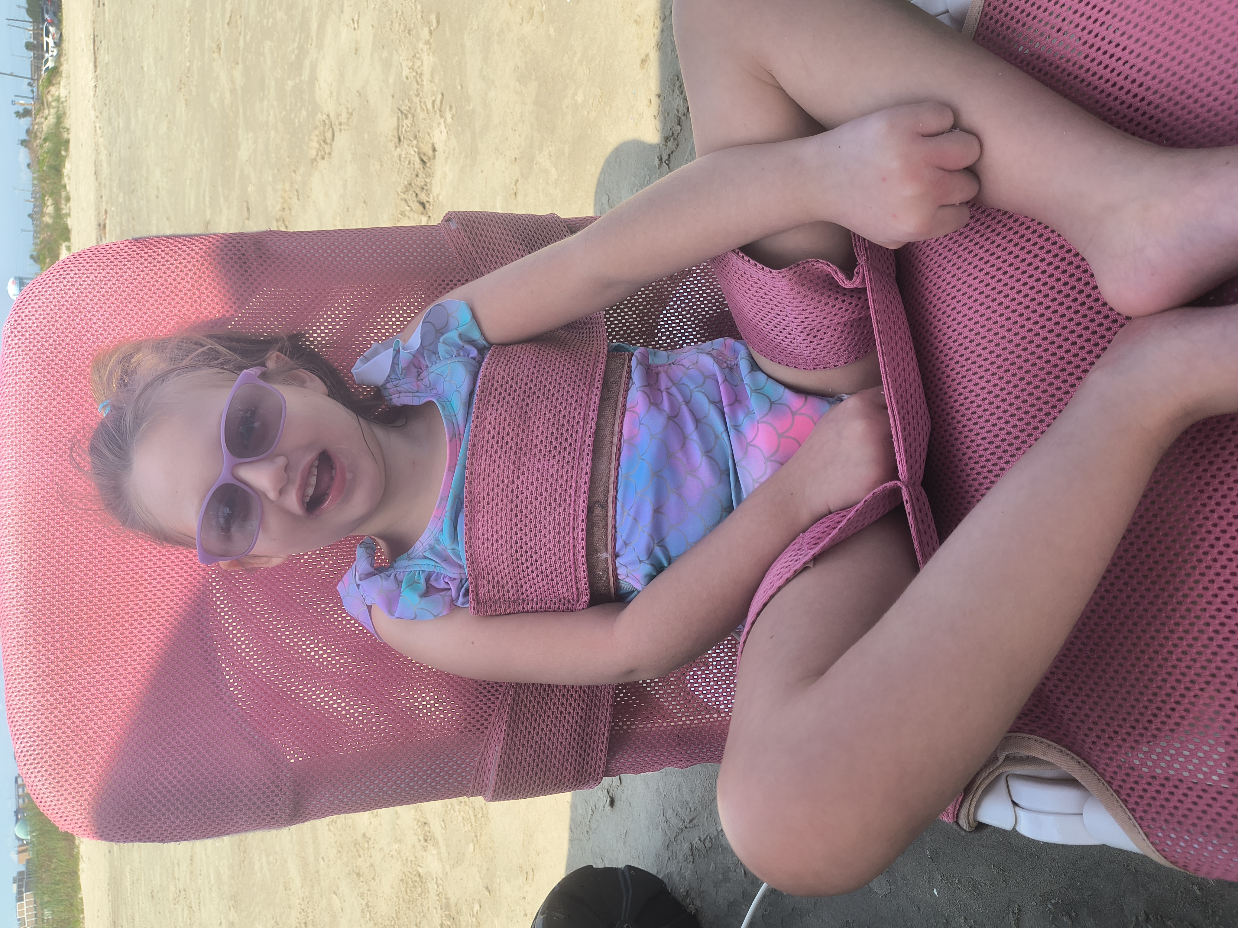 Jenna outside in her chair